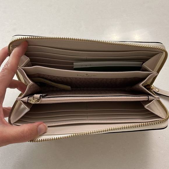Never used Kate Spade zip up wallet. - Picture 2 of 4